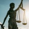 The political theories of justice developed by John Rawls and Robert Nozick present two influential but contrasting approaches to understanding fairness, rights, and the role of the state. Rawls argues that a just society should be organized according to principles that people would choose from an original position of equality, behind a "veil of ignorance," where they do not know their future social status, wealth, abilities, or background. According to Rawls, this thought experiment would lead individuals to support equal basic liberties for everyone, and to accept social and economic inequalities only when they benefit the least advantaged members of society. His theory emphasizes fairness, equal opportunity, and social responsibility. In contrast, Nozick's theory focuses on individual liberty, private property, and limited government. He argues that justice depends on whether holdings are acquired and transferred fairly, rather than on achieving equal outcomes. If individuals obtain wealth through legitimate means and voluntary exchanges, they have a right to keep it, regardless of resulting inequalities. Nozick believes that redistributive taxation and extensive government intervention infringe upon personal freedom and property rights. The key difference between Rawls and Nozick lies in their understanding of justice. Rawls prioritizes fairness and the welfare of disadvantaged groups, while Nozick prioritizes individual rights and freedom from state interference. Their theories continue to influence debates about equality, liberty, taxation, welfare policies, and the proper role of government in modern democratic societies.